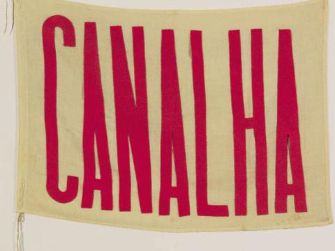 Viva Maria or "Long Live Maria" by artist Waldemar Cordeiro (1925-1973). Originally presented in 1966, at the Bahia Art Biennial, during Brazil’s civic-military dictatorship (1964-1985), the flag featured the word Canalha (scoundrel) sewn in felt. Credit: Luciana Brito Galeria, São Paulo, Brazil